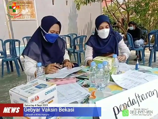 Meja pendaftaran vaksinasi COVID-19